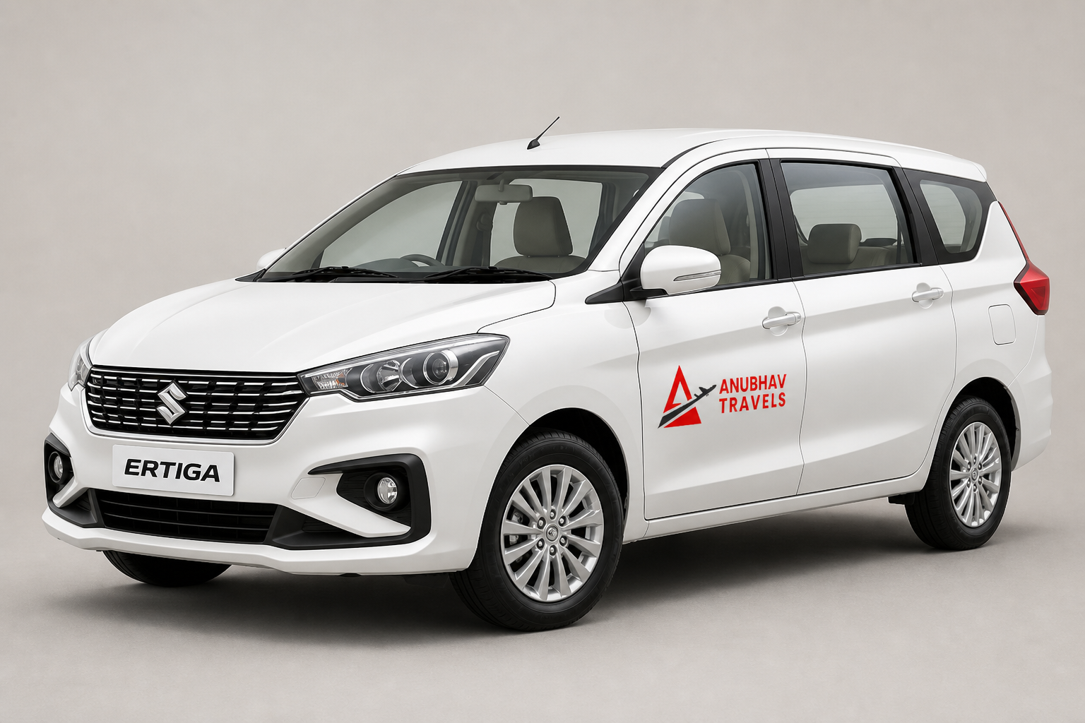 White Maruti Suzuki Ertiga with Anubhav Travels branding