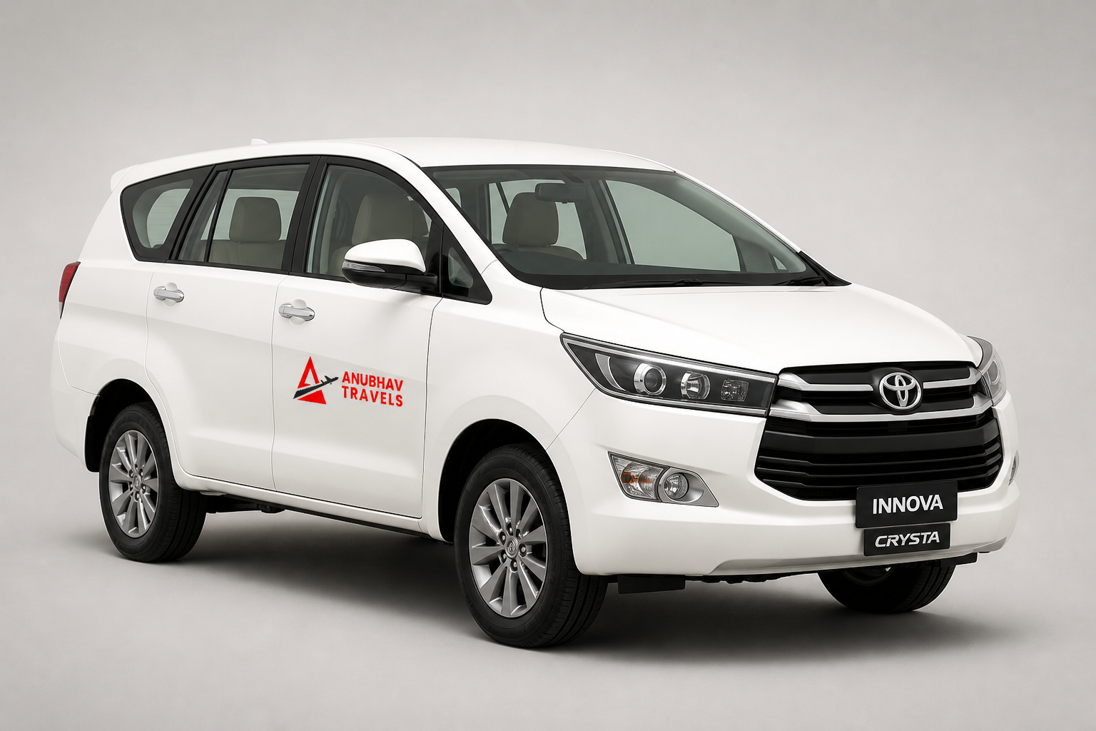 White Toyota Innova Crysta with Anubhav Travels branding
